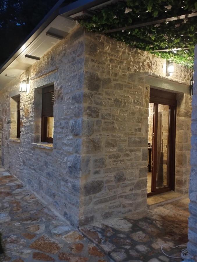 Ekali Stone House exterior, stone facade with garden
